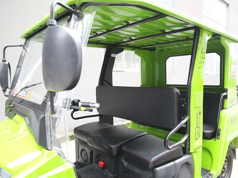 Wanhoo King Tiger Electric three-wheeler interior with 72V LFP battery and passenger seating